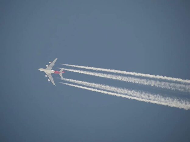 airplane with contrail
